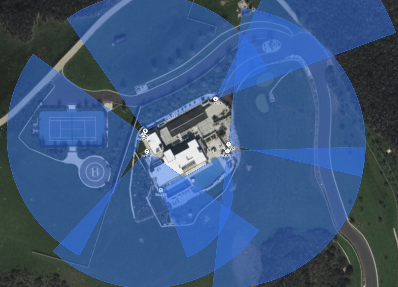 Security camera system layout showing aerial view of property with coverage zones